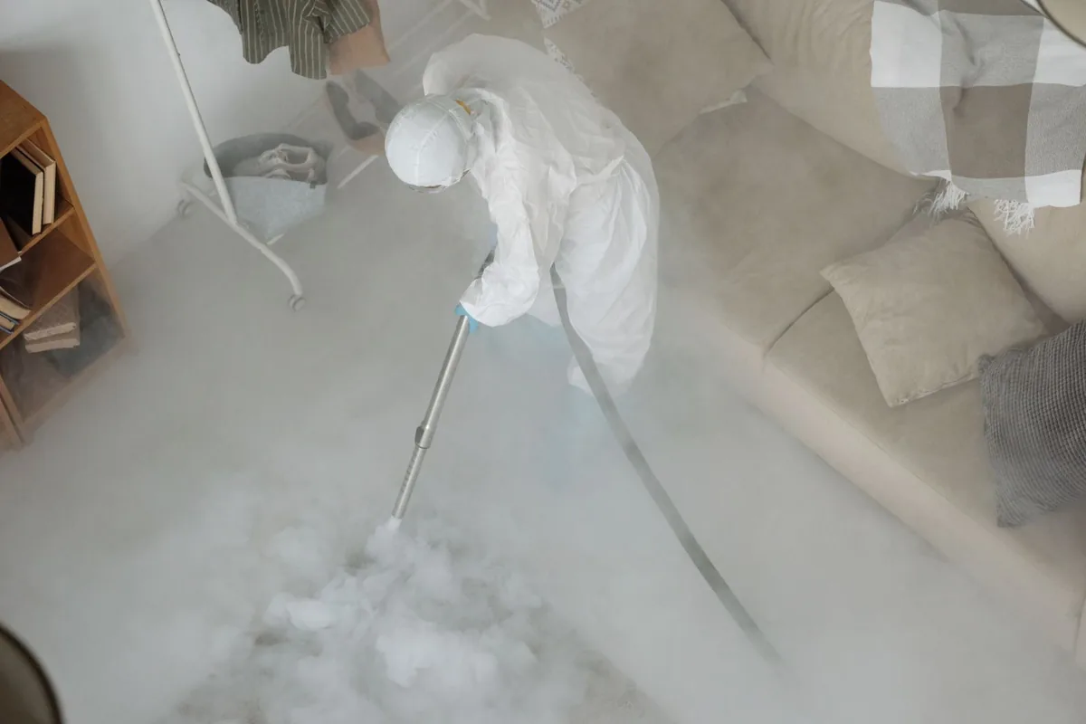 Biohazard cleanup technician in protective equipment, Ironton, OH